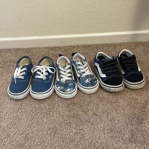 Three pairs of blue Vans